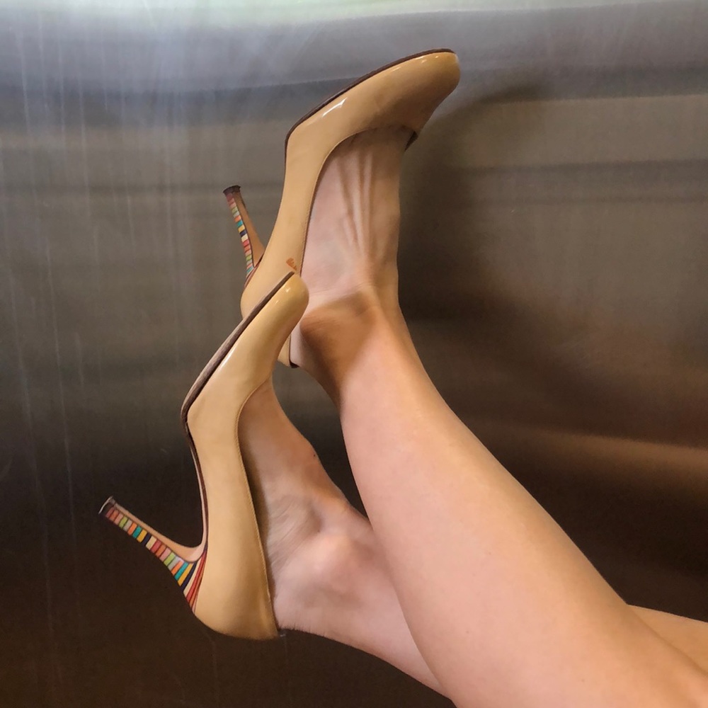 Kate Spade cream pumps